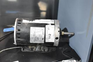 Interlink YSDK750-8C motor, 208-230/460 volts, 3 phase, used, with visible labels and mounting bracket.