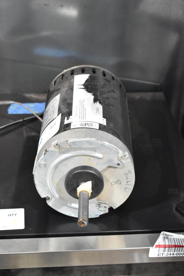 Interlink YSDK750-8C motor, 208-230/460 volts, 3 phase, visible labels, metal body, used condition.