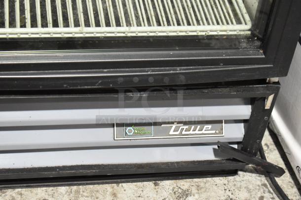 2021 True GDM-12-HC-LD Single Door Cooler, metal, poly coated racks, 115V, True logo, natural refrigerant label visible.