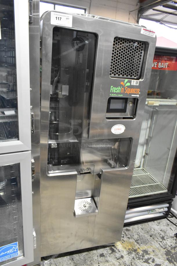 JBT Fresh N Squeeze stainless steel citrus juicer, commercial floor model, on casters. 115V, 1 Phase. Clean condition.