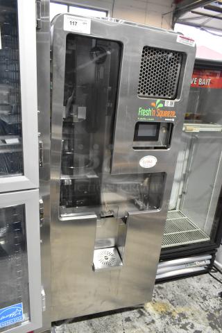 JBT Fresh N Squeeze stainless steel citrus juicer, commercial floor model, on casters. 115V, 1 Phase. Clean condition.