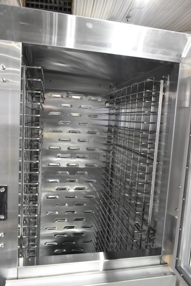 Avantco 177HTESDC1836 vacuum-insulated heated cabinet with clear Dutch doors, commercial casters, brand new, minor scratches.