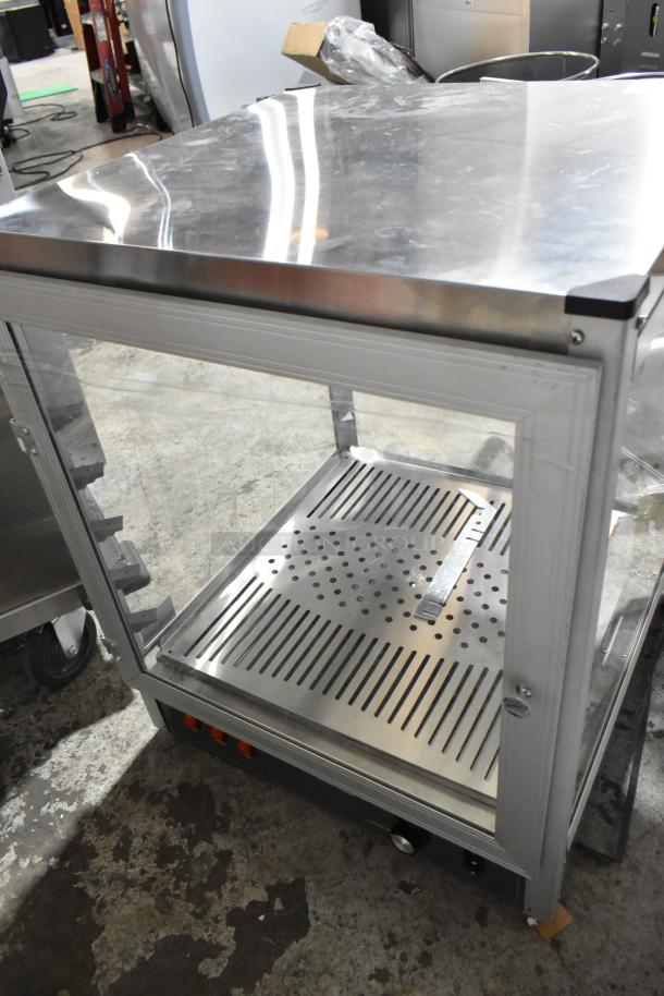Brand new Carnival King 382HPW18D2S 18" full service warmer, scratch and dent, 120V, 1 phase. Stainless steel design.