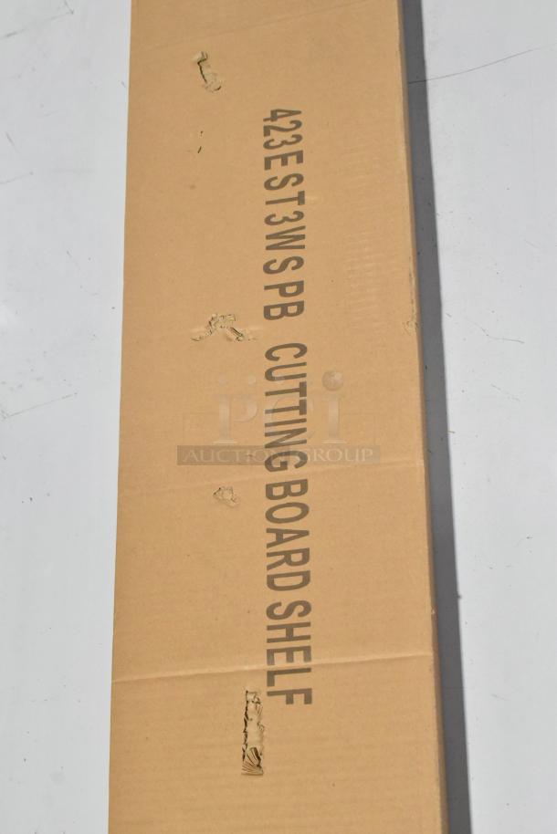 Cardboard packaging labeled "423EST3WSPB Cutting Board Shelf" for ServIt steam table accessory.