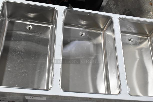 Brand new 2025 ServIt 423EST3WSPB stainless steel electric steam table with three pan sealed wells. Contains minor scratches.