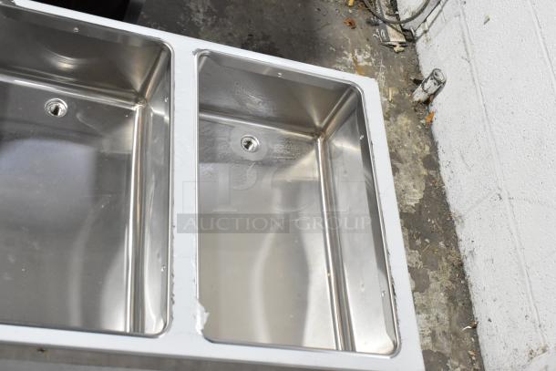 Brand new ServIt 423EST3WSPB stainless steel steam table with three sealed wells, scratch and dent condition.