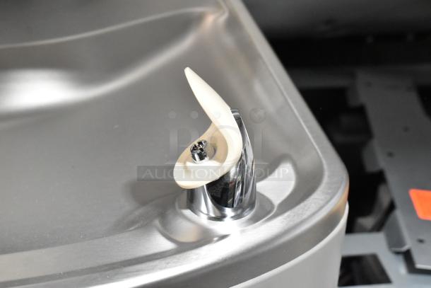 Elkay stainless steel 2-tier water fountain with bottle filler, showing dent, 115V, new condition, close-up of spout.