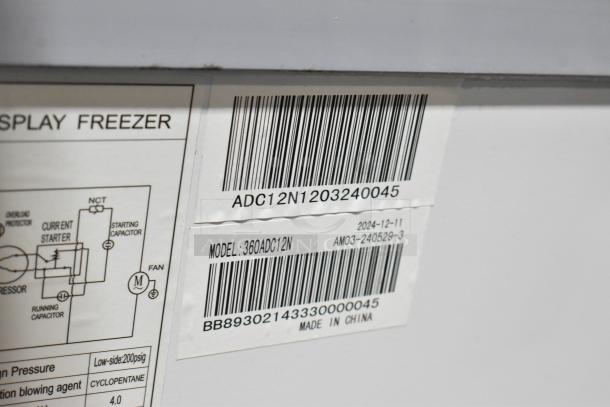 Brand new Avantco 360ADC12N metal ice cream dipping cabinet, 71", 115 volts. Tags show model and serial numbers.