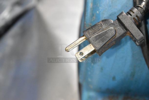 Xpower P-230AT Blue Air Mover plug and cord detail. 120 Volts, 1 Phase. Slight wear visible.