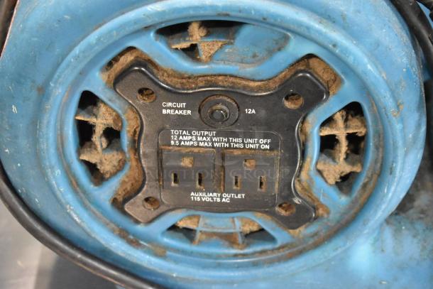 Xpower P-230AT blue air mover with circuit breaker, auxiliary outlet, visible wear. 120V, 1 Phase. Model markings present.