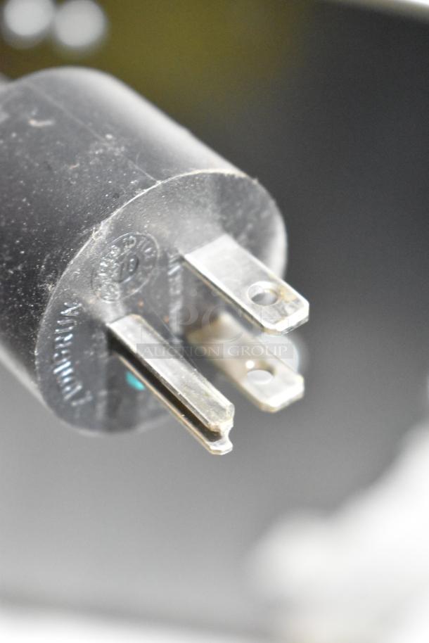 2021 Jun-Air 86R-3MN1-DSBHH plug close-up; part of the stainless steel Nitro Brew Nitrogen Generator on casters.