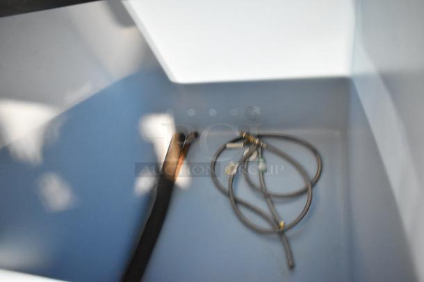 2024 Follett HMC1410WBT stainless steel commercial nugget ice head on an Ice-O-Matic bin, 208-230V, 1 phase.