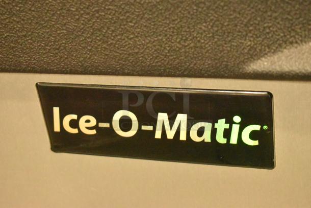 2024 Follett HMC1410WBT ice machine on Ice-O-Matic bin. Stainless steel, 208-230V, 1 phase. Ice-O-Matic logo visible.