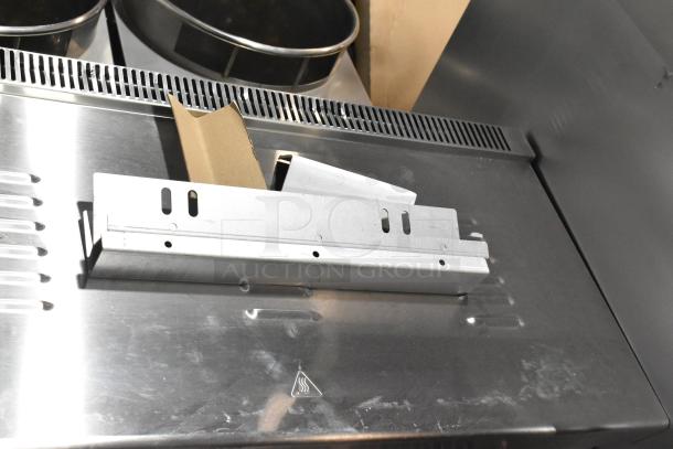 Brand new Cooking Performance Group infrared salamander broiler, model 351S36SBN, 34" stainless steel, 36,000 BTU, scratch and dent condition.