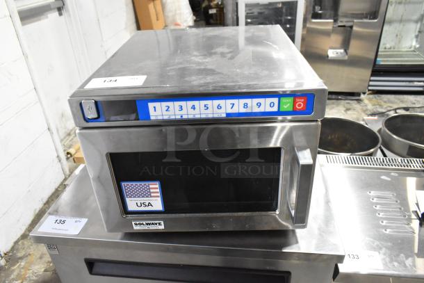 Brand new Solwave SWAHD18 stainless steel commercial microwave with push button controls, 208/240V, minor scratches.