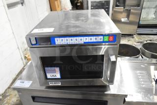 Brand new Solwave SWAHD18 stainless steel commercial microwave with push button controls, 208/240V, minor scratches.
