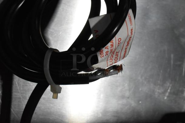Solwave SWAHD18 stainless steel microwave cord with visible scratch and dent, 208/240V. Tags indicate electrical specs.