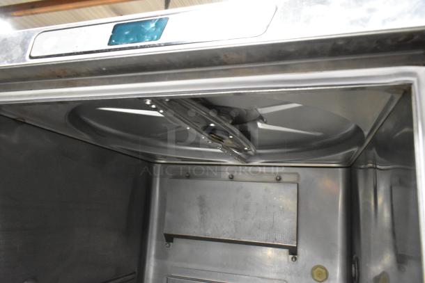 2022 Hobart LXER stainless steel commercial undercounter dishwasher interior. Model details and markings visible.