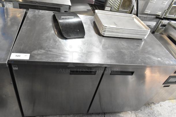 2018 Delfield UC4048P-STAR stainless steel undercounter cooler, 2-door, 115V, good condition, auction tag visible.