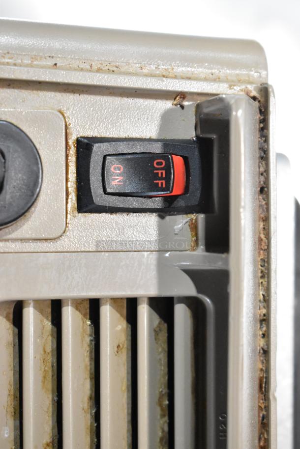 Vita-Mix VM0145 metal blender base, 120V, 1-phase. Features ON/OFF switch. Visible wear, indicative of usage.