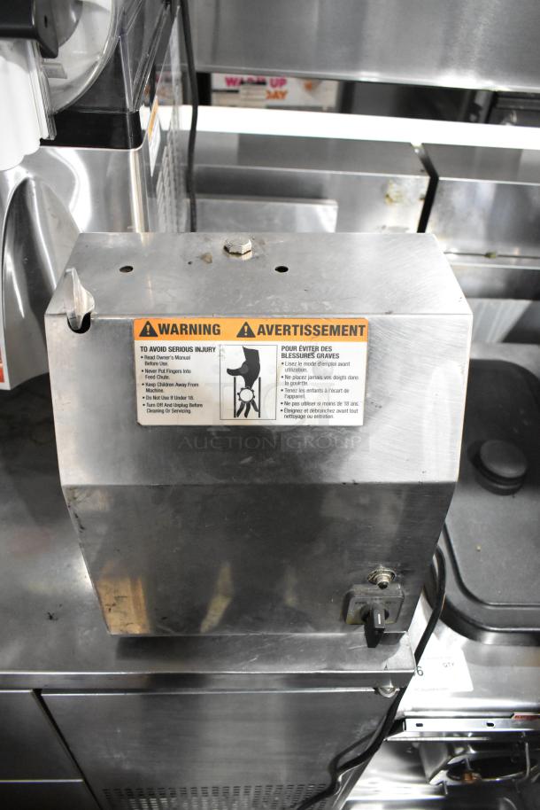 Globe CM22 Commercial Meat Grinder Base, stainless steel, 115V, 1 phase, warning label visible, sturdy condition.