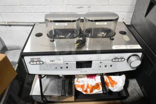 Schaerer Barista stainless steel commercial espresso machine, 2 group, with 2 portafilters, steam wands; 208/240 volts, 1 phase.