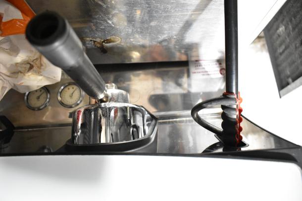 Schaerer Barista stainless steel 2 group espresso machine, features dual portafilters and steam wands, 208/240V, 1 phase.