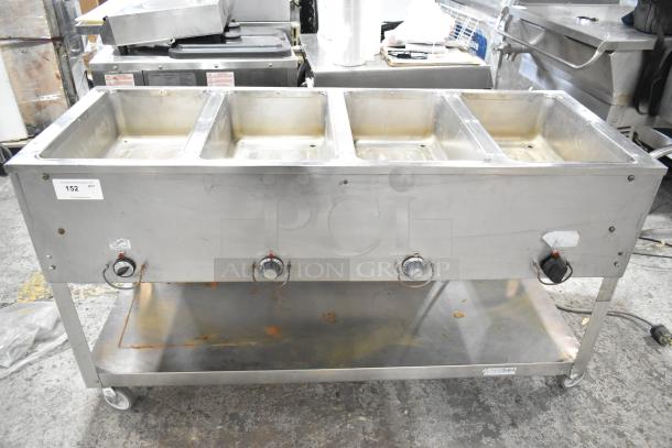 "Duke Aerohot EP304 4-well steam table, metal, commercial, electric powered, 208 volts, 1 phase, visible wear."