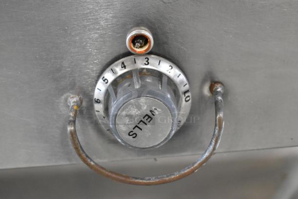 Duke Aerohot EP304 steam table control, metal, labeled "WELLS," with numbered dial, electric, 208V, 1 phase.