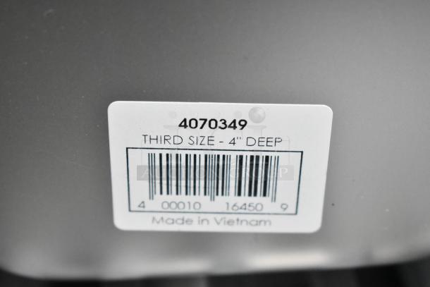 Label on stainless steel drop-in bin, model 4070349, third size, 4" deep, made in Vietnam.