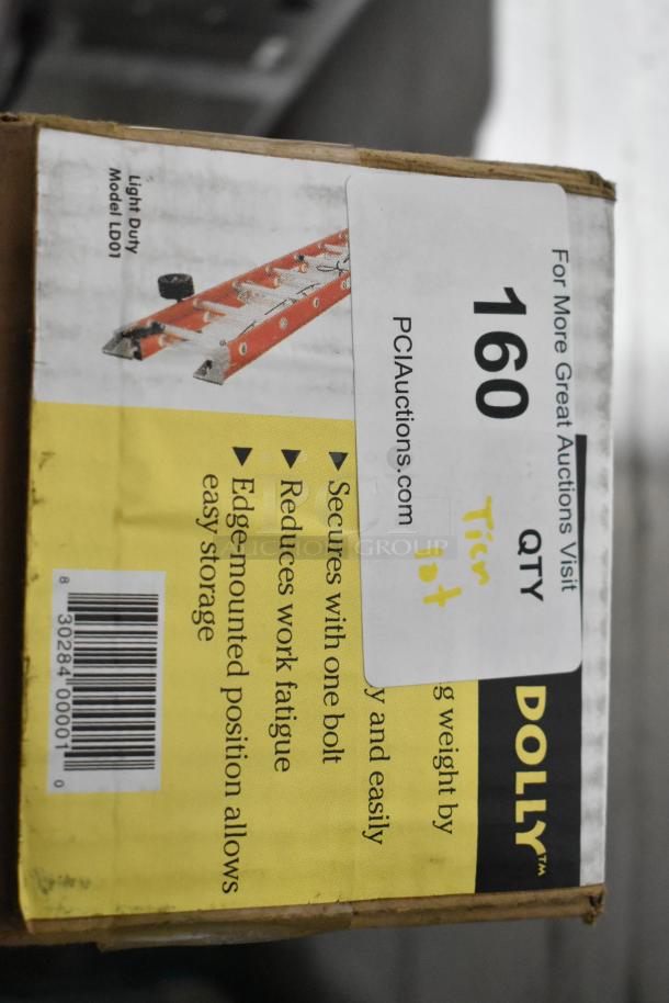 Auction item label showing "Tier Lot" including ladder dolly, rolling tool organizer, toilet pipe extender, Model LD001.