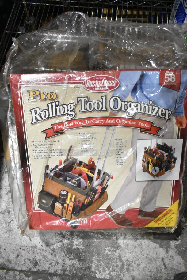 "ALL ONE MONEY! auction lot featuring a new Bucket Boss Pro Rolling Tool Organizer with 58 pockets, packaged in clear wrap."