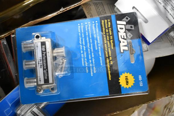 Tier lot with Ideal 3-way cable TV splitter, 1 GHz, items include file folders, plastic sheeting, doorknob, outlet covers.