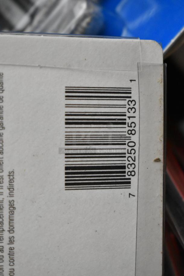 Barcode on packaging of miscellaneous item lot, including file folders and outlet covers, in fair condition.