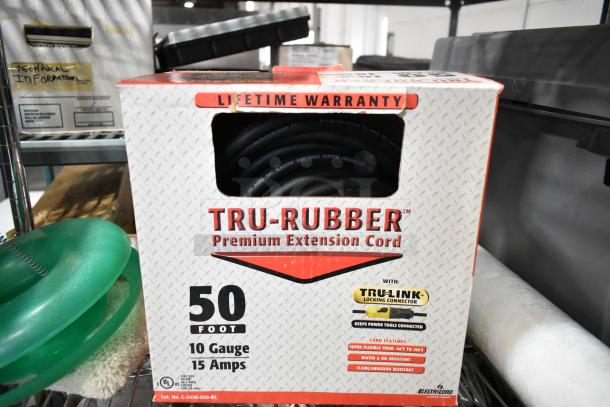 Tru-Rubber 50ft extension cord, 10 gauge, 15 amps, with Tru-Link connector and lifetime warranty. Box indicates water, oil, and flame resistance.