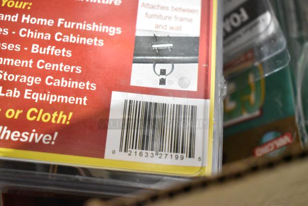 Alt text: Tier lot with Tru Rubber extension cord, gray poly toolbox, and various boxed items. Barcode visible.