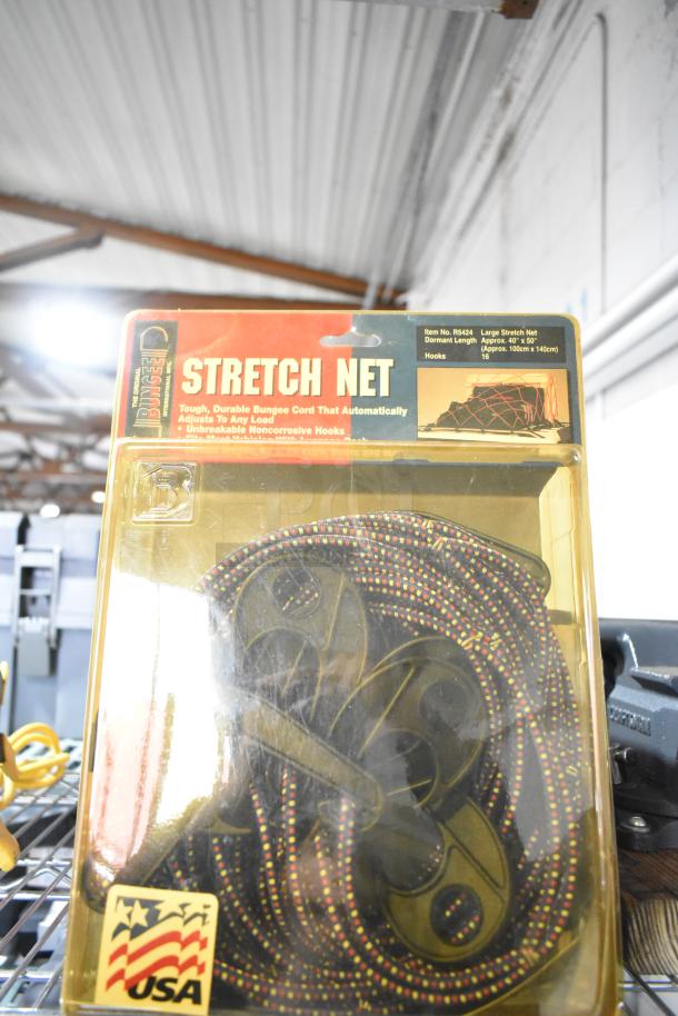 Stretch Net bungee cord in packaging, item no. R5424, approx. 40"x50", with 16 noncorrosive hooks, made in USA.