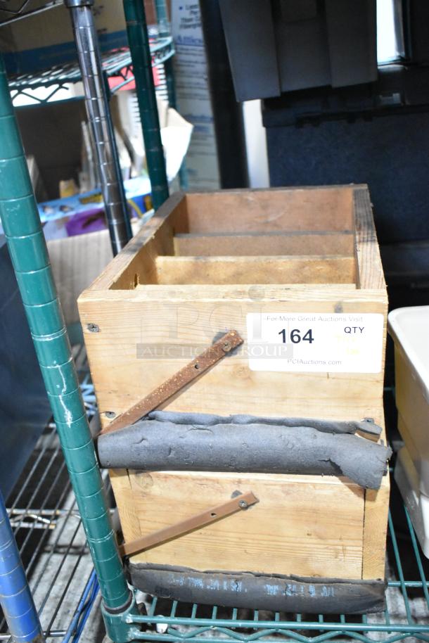 Wooden tier lot containing assorted tools and supplies. Tag reads "164 QTY Tier Lot PCIAuctions.com."