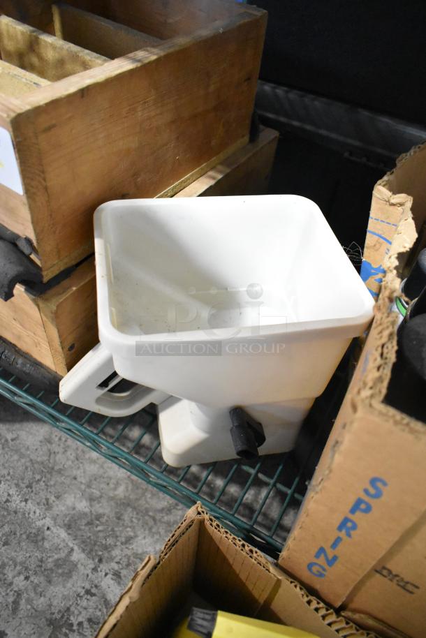 Assorted tier lot featuring an EZ Handspreader, nails, and Sears air tool lubricating oil, in good condition.