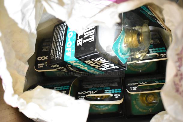 Box containing several Smart Bulb auto-off devices. Packaging visible with product details.