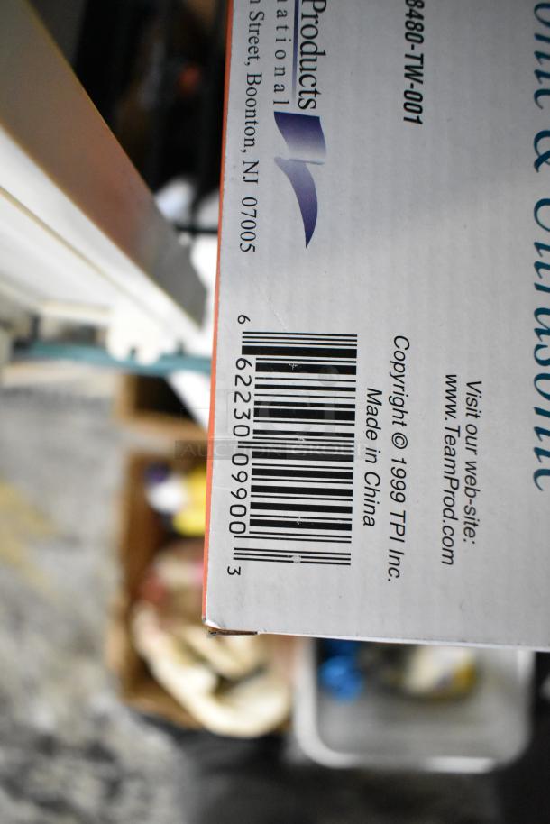 Tier lot of various items including a Maytag window air conditioner, Sure Sak drum liners, keyed entry knobset, and brake fluid. Box with label: TPI Inc., Made in China.
