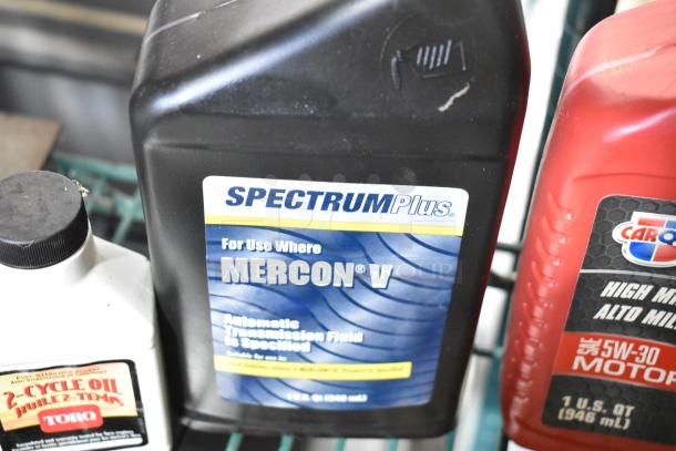 A bottle of Spectrum Plus MERCON V automatic transmission fluid, 1 quart, in good condition.