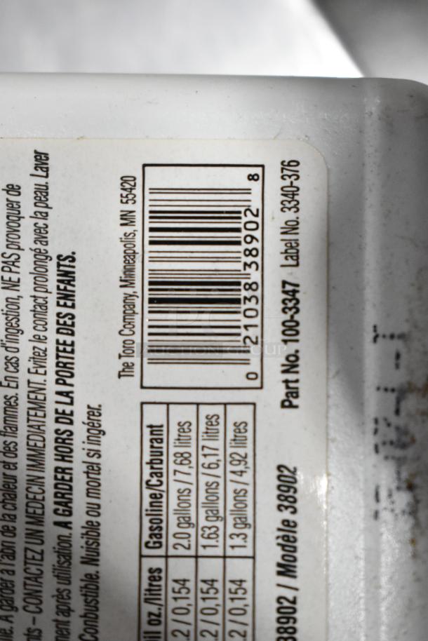 Label on container with barcode, gas capacity chart, and text. Part No. 100-3347. Model 33902 by The Toro Company.