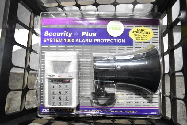 ALL ONE MONEY! tier lot includes Security Plus System 1000 alarm in packaging. Features motion sensor, keypad, and expansion option.