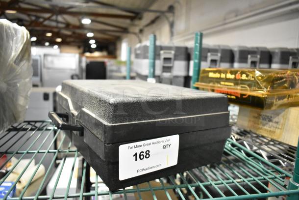 Gray hard box containing jumper cables, resting on a metal shelf. Item tag reads "168" for auction reference.