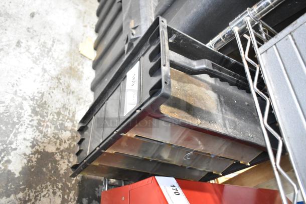 Poly hardware holder with bins, black, sturdy construction, minor surface dust. Visible labels indicate item numbers.