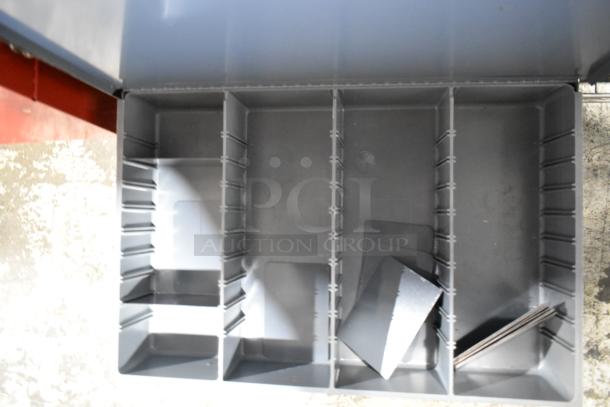 Gray metal hardware box with dividers, featuring four empty drawers. Excellent condition, ideal for organizing tools.