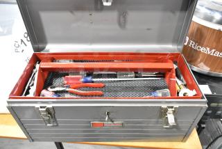 Craftsman gray metal tool box with various tools, featuring locking latches and red interior tray. Good condition.