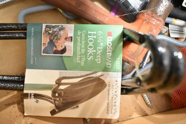 Tier lot including ClosetMaid 6¾" deep hooks, wires, gloves, poly boxes; hooks package shows image and measurements.