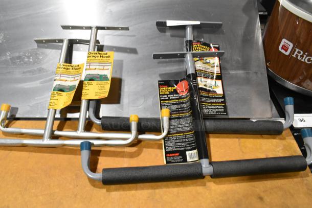 Tier Lot with Overhead Storage Hooks, Goldblatt Panel Carry, and Giant Wall Storage Hangers, new condition with labels.